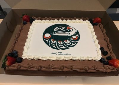Cake with q̓ələχən House Bald Eagle logo